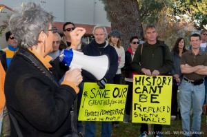 Cathy Blaivis speaks to demonstrators at Plummer Park's Great Hall / Long Hall
