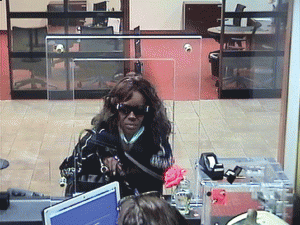 Brianna Kloutse robbing a bank (Photo courtesy of L.A. Police Department).