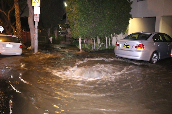 A water main break flooded North Formosa Avenue this morning (Photo by Jim Garrecht).