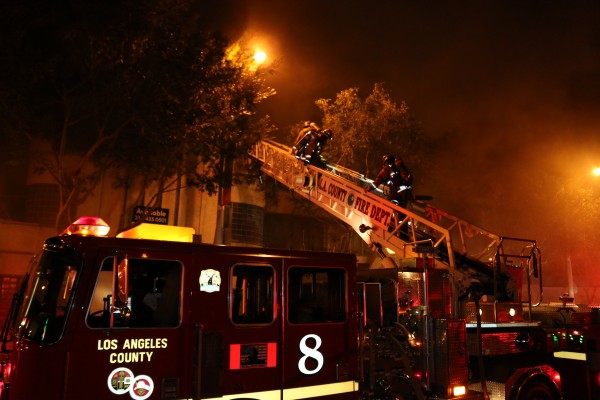 Firefighters at 9080 Santa Monica Blvd. on May 21. (Photo by Jim Garrecht)