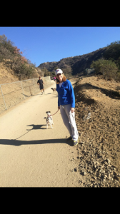 An apparently un-disabled Heidi Shink on a hike with her dog.