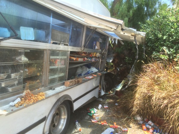Four people were injured today in the crash of a food truck on North Doheny Drive (Photo by Jim Garrecht)