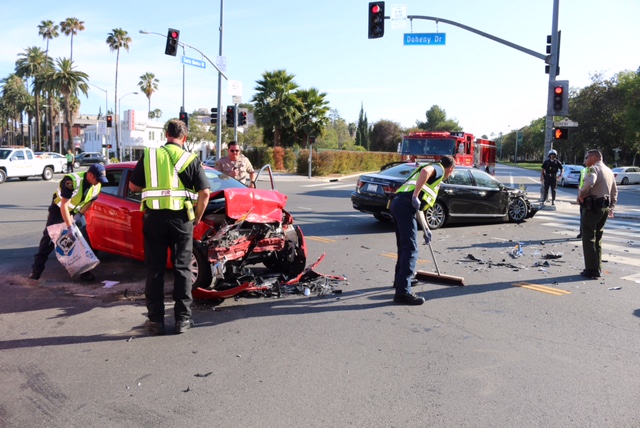 Crash around 5:30 p.m. today at the intersection of Santa Monica Boulevard and Doheny in West Hollywood. (Photo by Jim Garrecht)