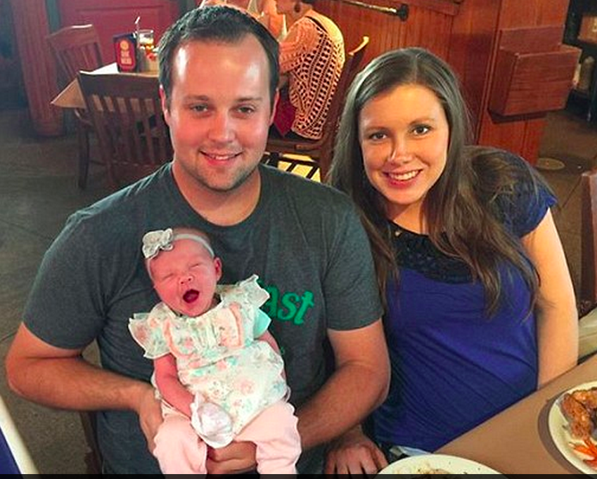 "19 Kids and Counting" star Josh Duggar with wife Anna and the new baby in happier times. (Photo from Facebook)