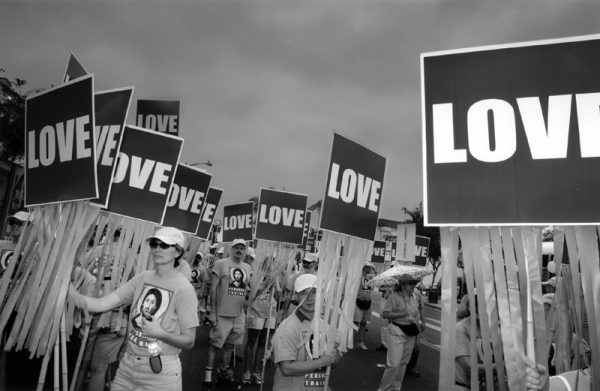 Gay Episcopalians quietly carrying love signs at the 34th Annual Gay, Lesbian, Transgender and Bisexual Pride Parade in 2004. (Photo by Douglas McCulloh, L.A. Neighborhoods Project, Los Angeles Public Library Photo Collection)