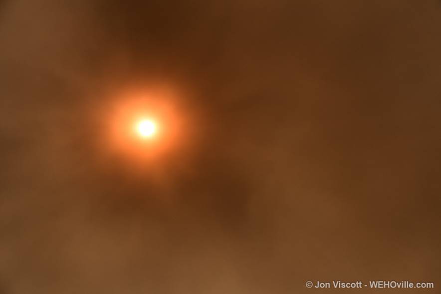 The sun over West Hollywood, obscured by smoke from the Santa Clarita Valley fire. (Photo by Jon Viscott).