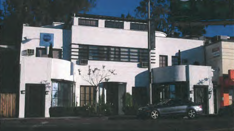 9165 Sunset Blvd. was constructed in 1936 as a mixed-use building. It is significant ... for its embodiment of distinctive characteristics from the Streamline Moderne style, for its association with the history of commercial development in West Hollywood, for its identification with Paul Kohner, and for its representation of a work by notable architect Paul Williams. It is one of a small number of commercial buildings remaining on Sunset Boulevard that were constructed during the late 1920s and 1930s. Dubbed the Sunset Strip, this stretch of unincorporated county road was a hub for offices, shops, restaurants, and nightclubs that became synonymous with Hollywood glamour ... By the early 1920s it was the main artery between the motion picture studios in Hollywood and the preferred residential area for film stars in Beverly Hills. While Santa Monica Boulevard was characterized by the electric streetcar, Sunset Boulevard was designed for the automobile. The earliest commercial development began in 1925 by Francis S. Montgomery in an area later known as Sunset Plaza, a collection of upscale shops and offices with extensive parking located behind each building. 