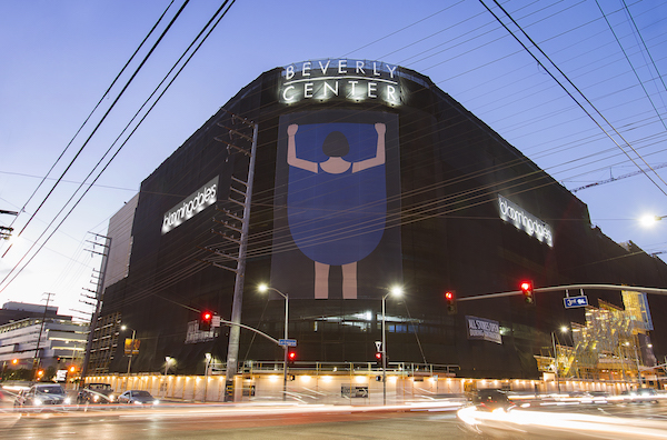 "Girl Lifting Skirt 2" by Geoff McFetridge on the exterior of the Beverly Center facing the intersection of La Cienega Boulevard and Third Street. (Photo by Charlie Cho)