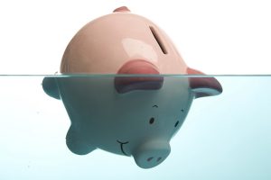 debt-pig-drowning