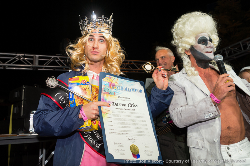 Darren Criss bemused as City Councilmember John D'Amico takes the mike. (Photo by Jon Viscott, courtesy of the City of West Hollywood).